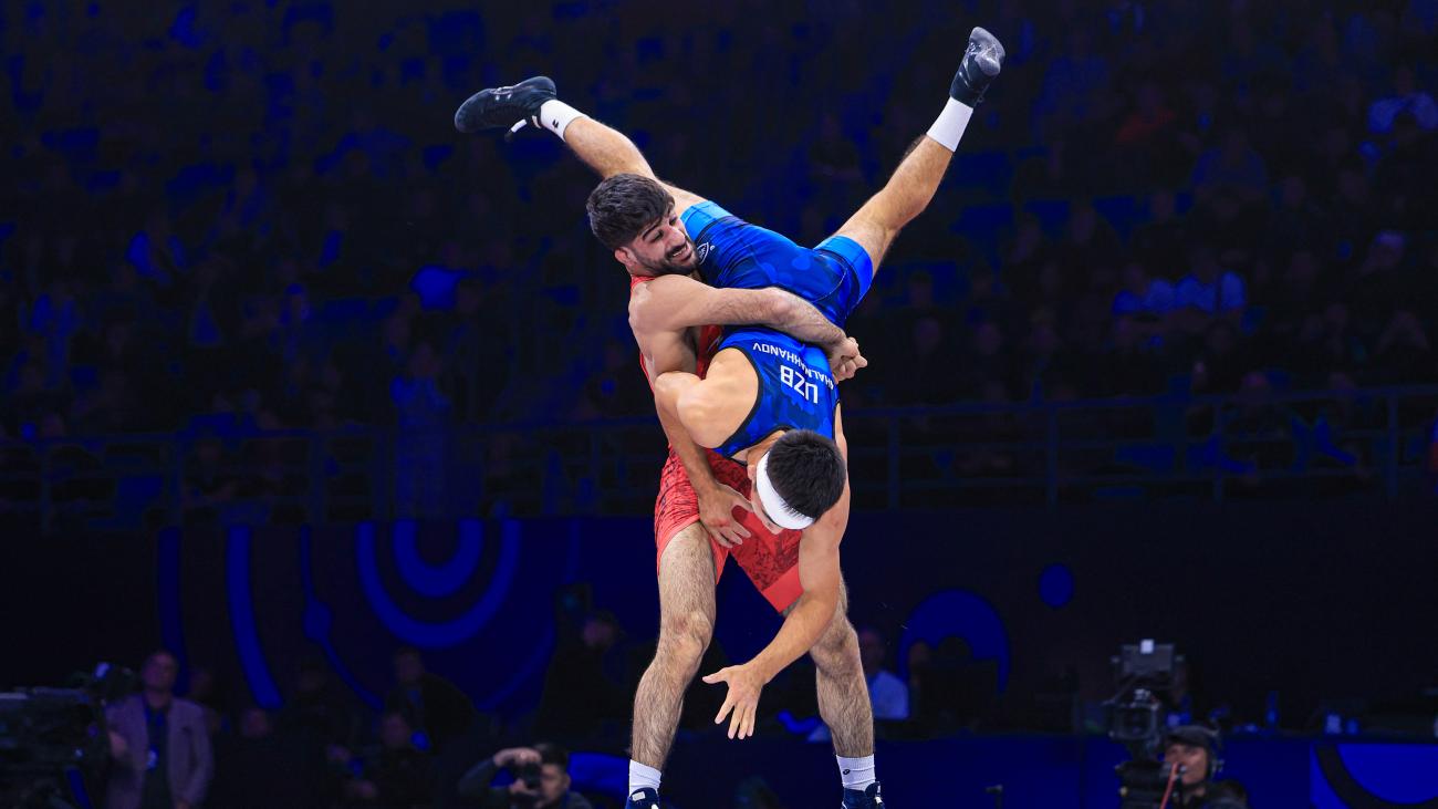 Esmaeili Fends Off Incursion to Continue Reign at 67kg