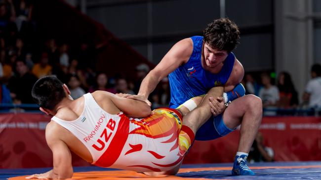 Russia, Iran Place Two into Freestyle Finals at YOG