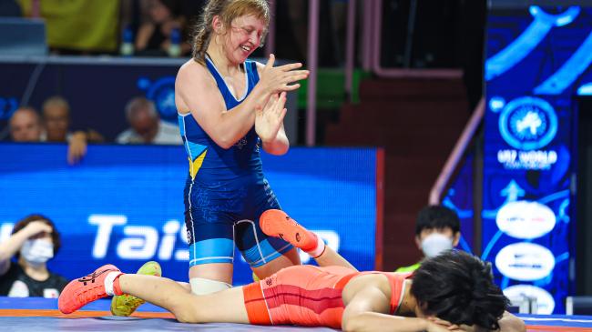 Unbeaten Yefremova repeats as U17 world champ; Japan steals WW title