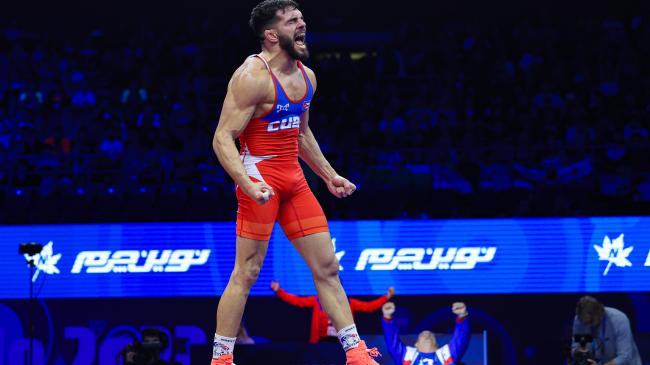 Olympic champ Orta wins first world title in move up to 67kg