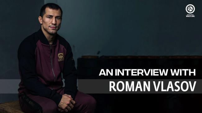 What's the driving force behind Vlasov's attempt to win a third Olympic title?